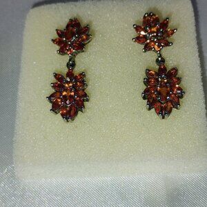 Orange sapphire dangling earrings in sterling silver